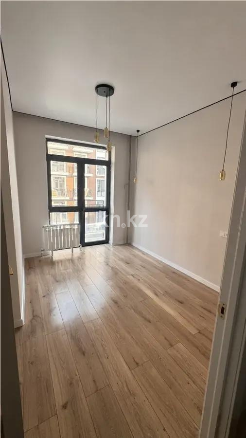 Продажа 2-комнатной квартиры, 52 м², мкр-н Нуркент, дом  9/9 в Алматы - фото 2