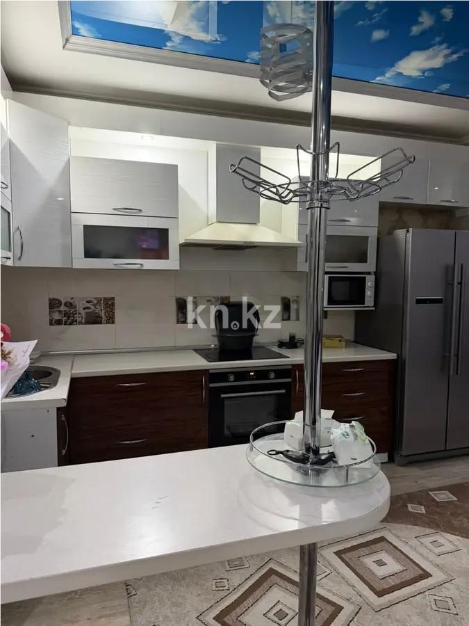 Продажа 2-комнатной квартиры, 65 м², ул. Толе би, дом  286/5 в Алматы - фото 2