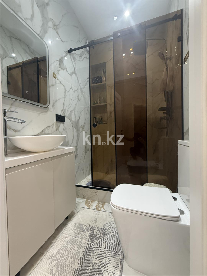 Продажа 4-комнатной квартиры, 120 м², ул. Ашимова, дом  13 в Караганде - фото 34