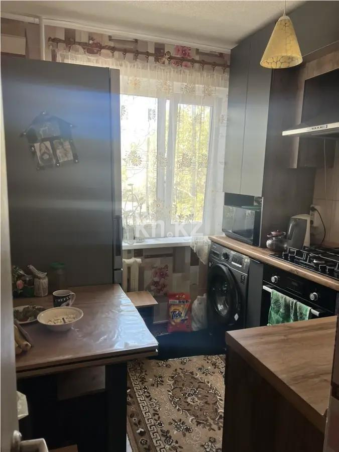 Продажа 3-комнатной квартиры, 61 м², 14 мкр., дом  4а в Караганде - фото 4