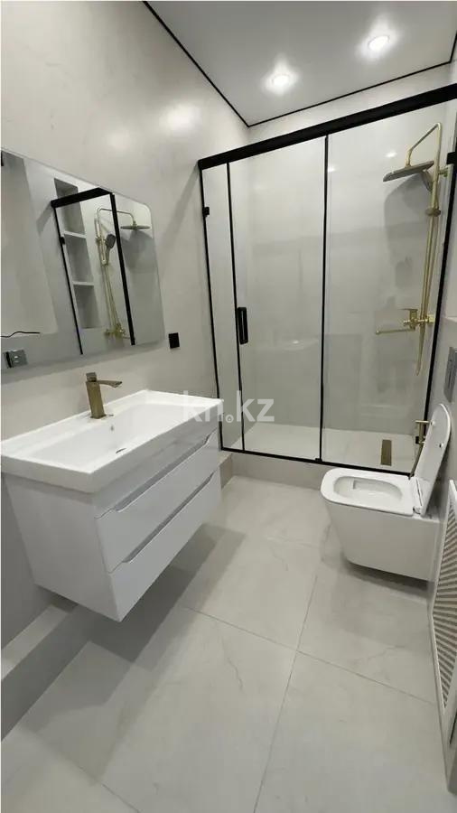 Продажа 2-комнатной квартиры, 56 м², мкр-н Нуркент, дом  6/2 в Алматы - фото 4