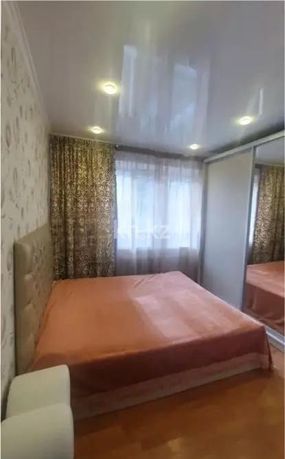 Продажа 2-комнатной квартиры, 56 м², мкр-н 11а, дом  25 в Караганде - фото 2