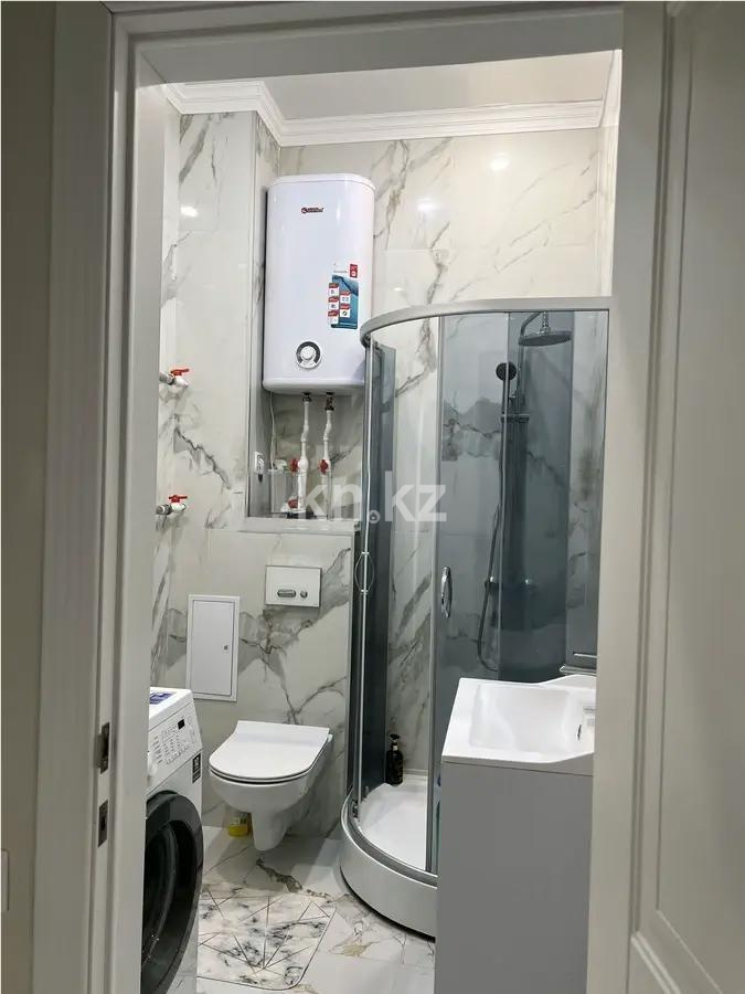 Продажа 4-комнатной квартиры, 140 м², ул. Муканова, дом  1/9 в Караганде - фото 6