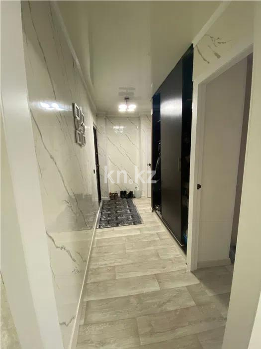 Продажа 3-комнатной квартиры, 58 м², 12 мкр., дом  36 в Караганде - фото 6