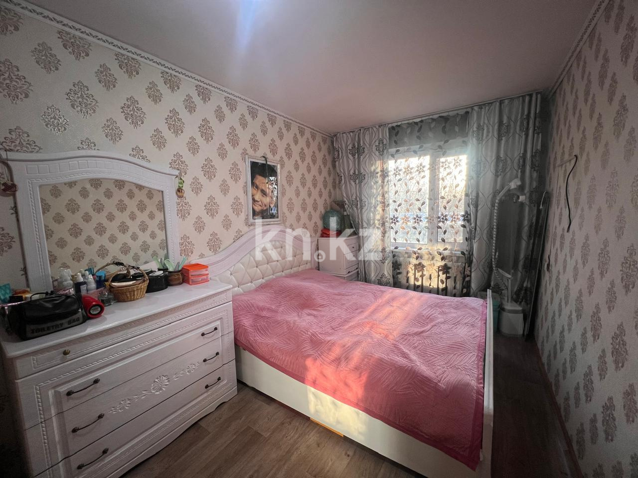 Продажа 3-комнатной квартиры, 61 м², 18 мкр., дом  22 в Караганде - фото 4