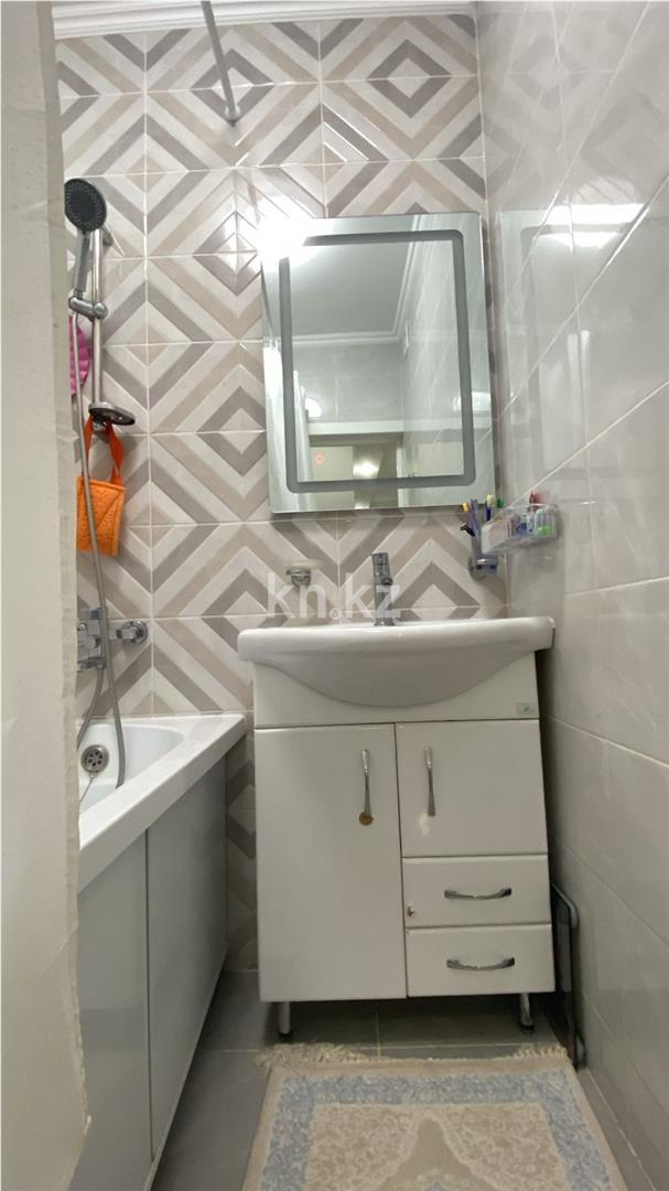 Продажа 2-комнатной квартиры, 65 м², ул. Сыганак в Астане - фото 10