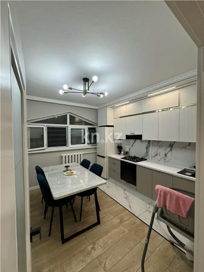 Продажа 2-комнатной квартиры, 58 м², ул. Тургута Озала, дом  94 в Алматы - фото 3