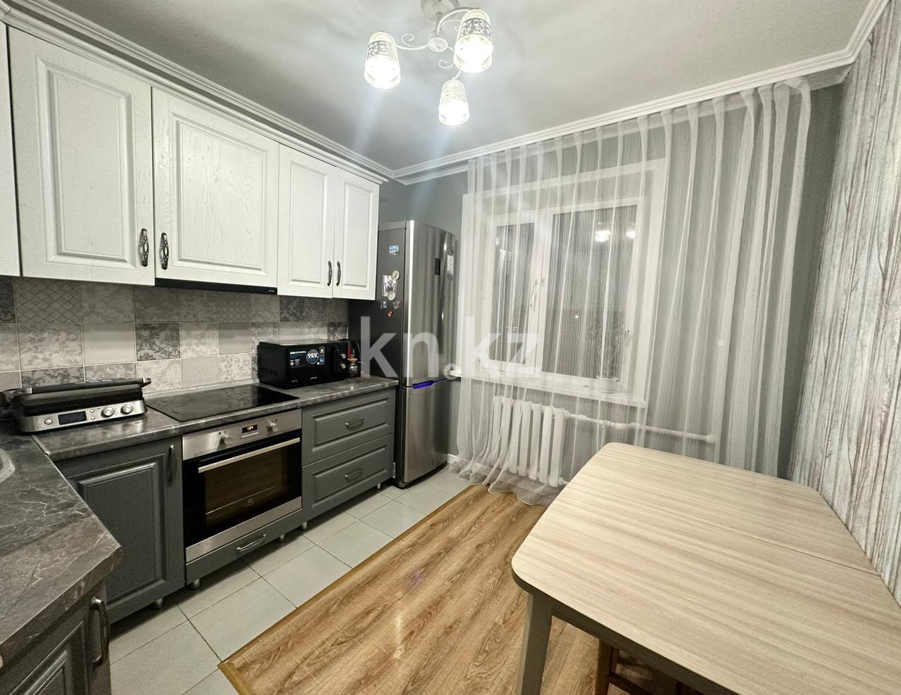 Продажа 3-комнатной квартиры, 65 м², ул. Муканова, дом  80 в Караганде - фото 6