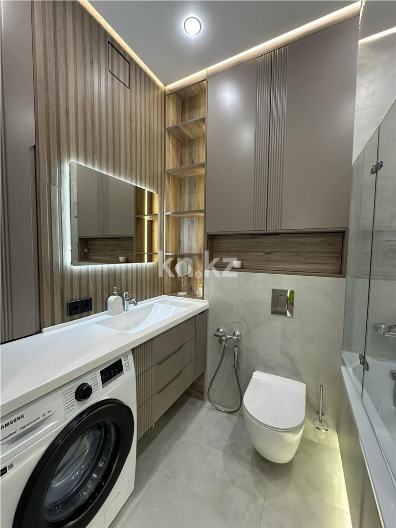 Продажа 2-комнатной квартиры, 64.15 м², ул. Толе би в Астане - фото 11