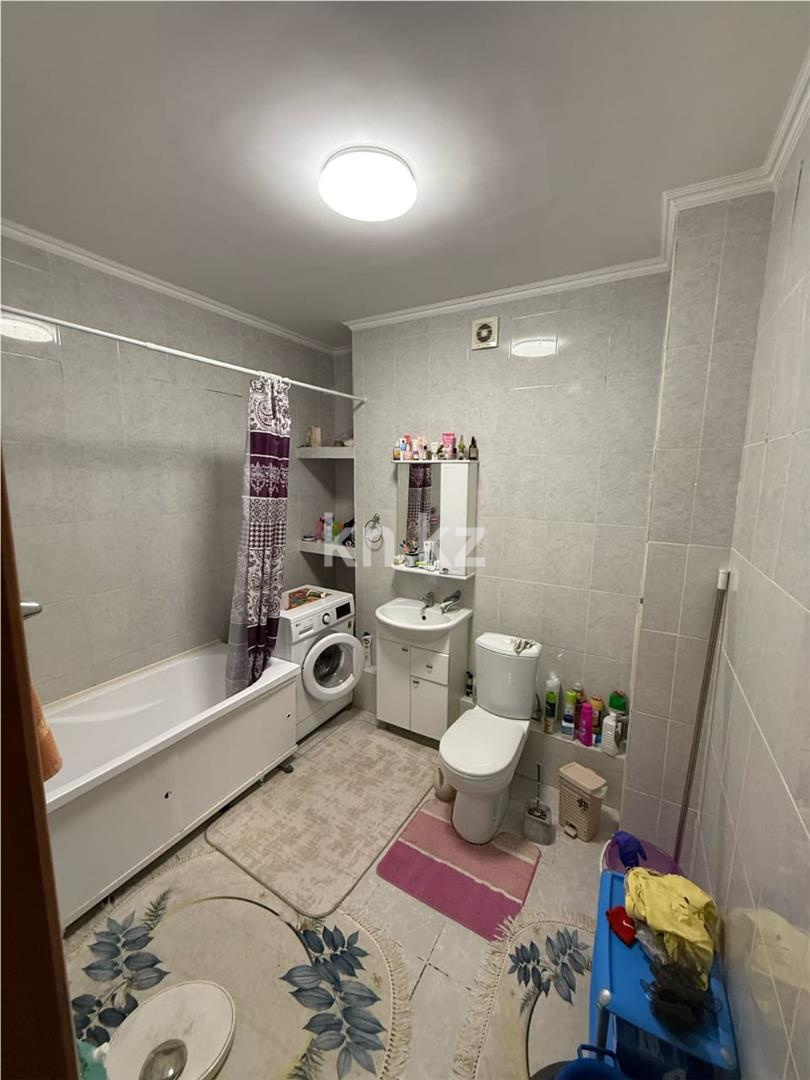 Продажа 2-комнатной квартиры, 53.9 м², ул. Сыганак в Астане - фото 7