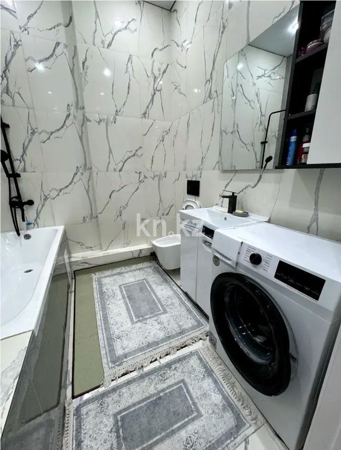 Продажа 2-комнатной квартиры, 56.7 м², пр. Туран в Астане - фото 4