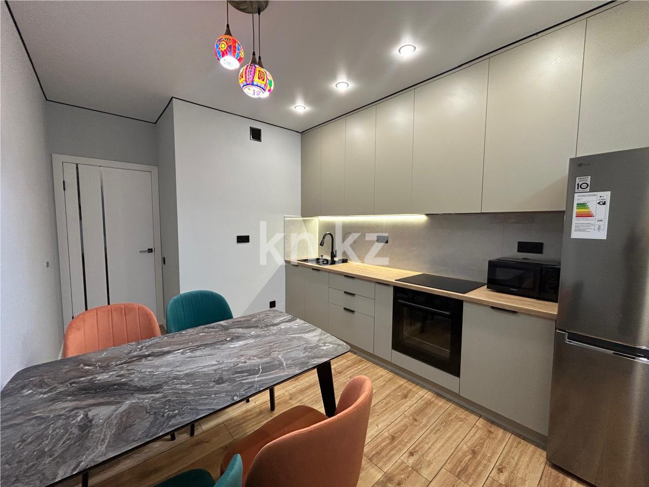 Продажа 2-комнатной квартиры, 57.4 м², ул. Толе би в Астане - фото 6