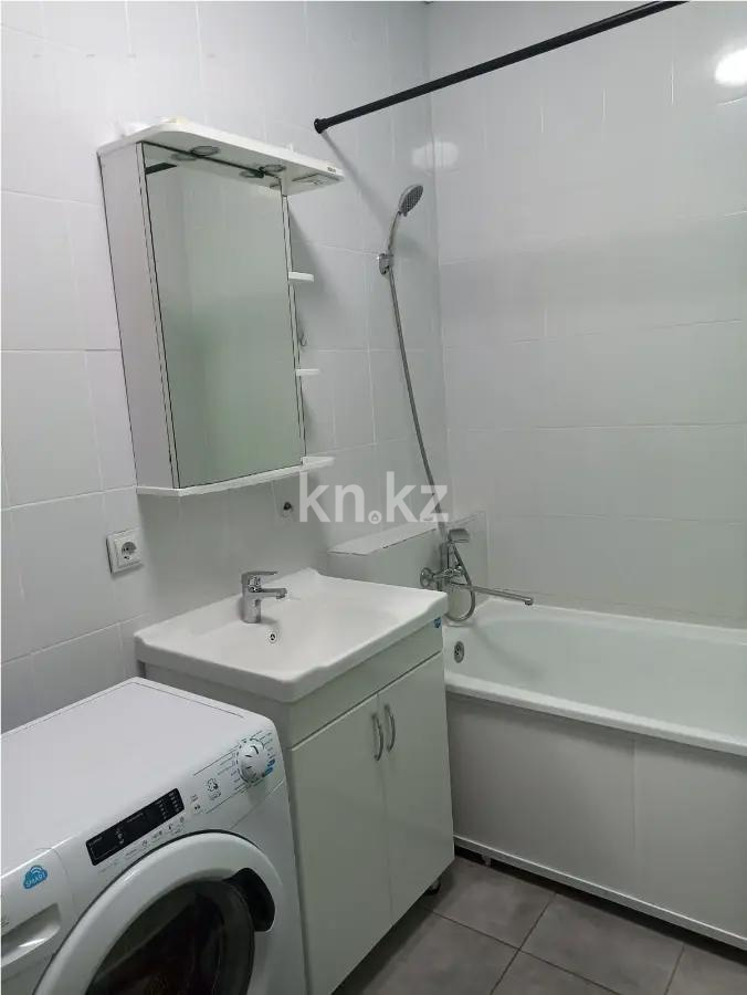 Продажа 1-комнатной квартиры, 46 м², ул. Омарова, дом  3 в Астане - фото 3