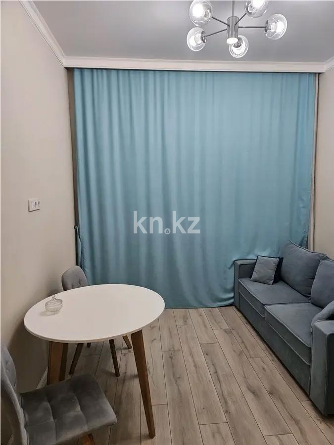 Продажа 1-комнатной квартиры, 40 м², ул. Толе би, дом  57 в Астане - фото 2