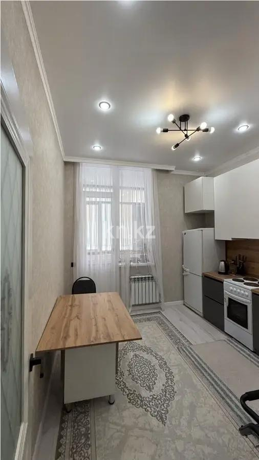 Продажа 1-комнатной квартиры, 42 м², ул. Толе би, дом  25/1 в Астане - фото 2