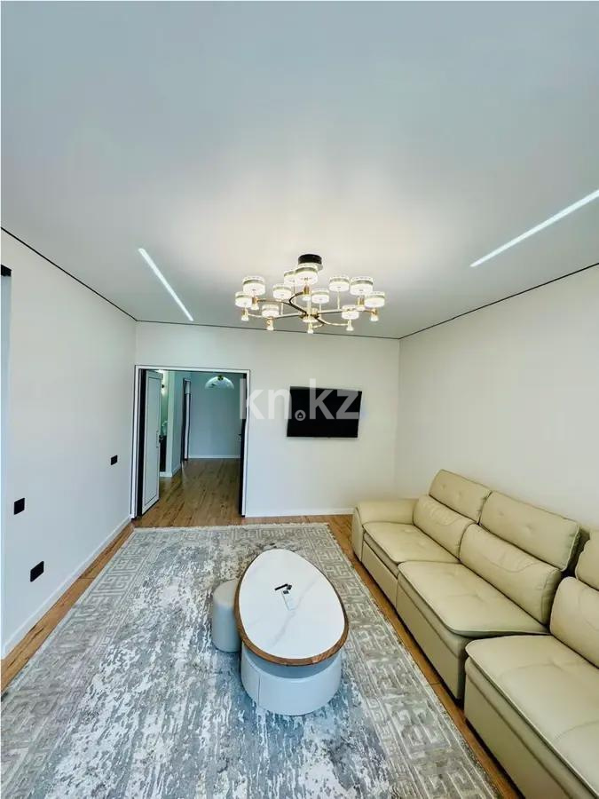 Продажа 3-комнатной квартиры, 100 м², ул. Толе би, дом  285/8 в Алматы - фото 2