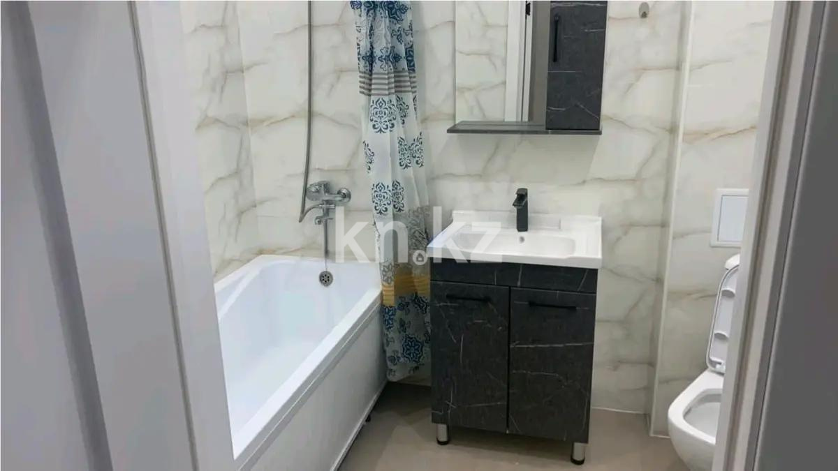 Продажа 1-комнатной квартиры, 38 м², ул. Омарова, дом  12в в Астане - фото 3