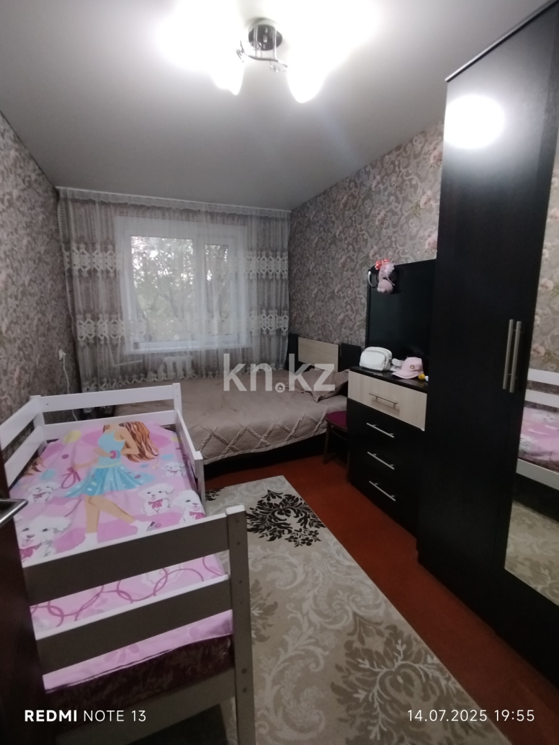 Продажа 3-комнатной квартиры, 62 м², 15 мкр., дом  18 в Караганде - фото 8