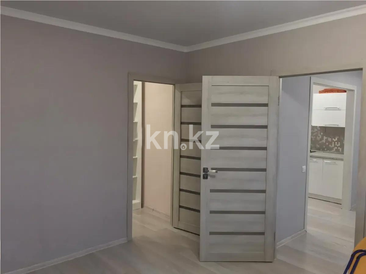 Продажа 2-комнатной квартиры, 57 м², мкр-н Аксай-5, дом  25 в Алматы - фото 4