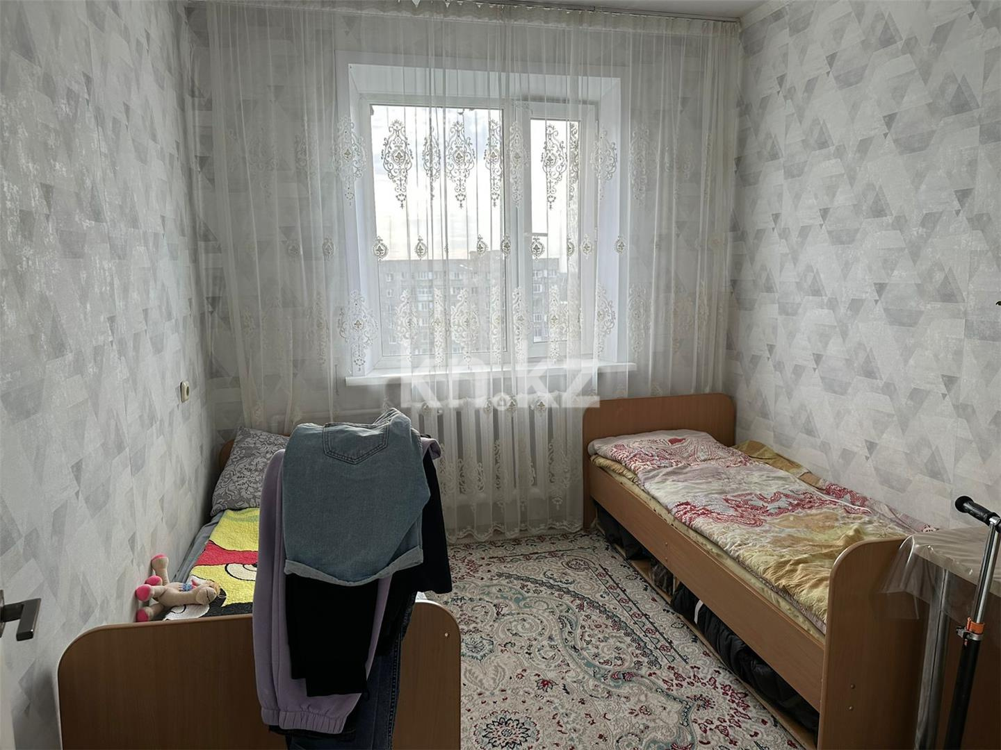 Продажа 4-комнатной квартиры, 77 м², ул. Карла Маркса в Караганде - фото 4