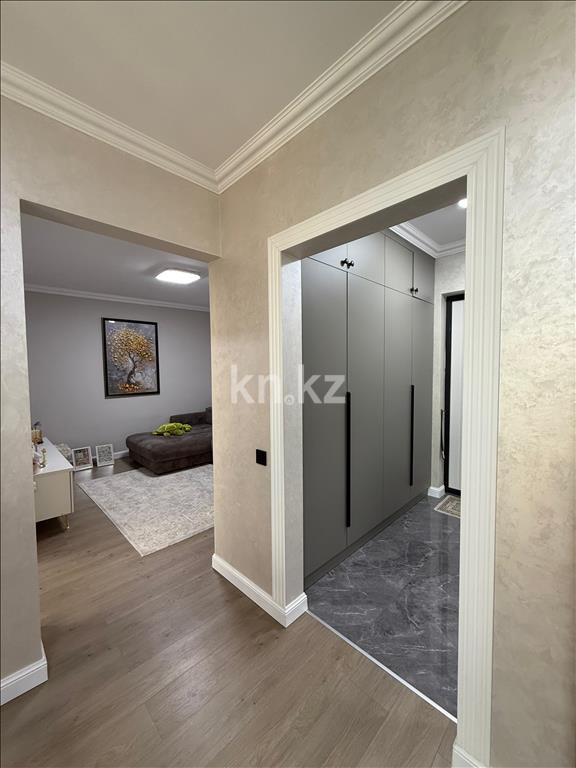 Продажа 2-комнатной квартиры, 52 м², ул. Толе би, дом  285/8 к13 - ул. Утеген батыра в Алматы - фото 4