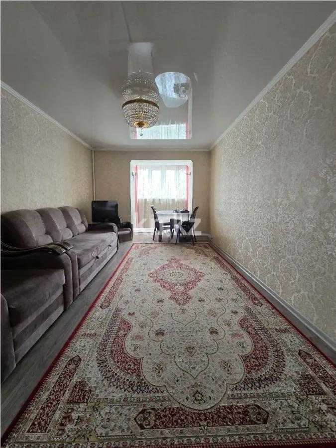 Продажа 3-комнатной квартиры, 63 м², ул. Аманжолова, дом  71а в Караганде - фото 2