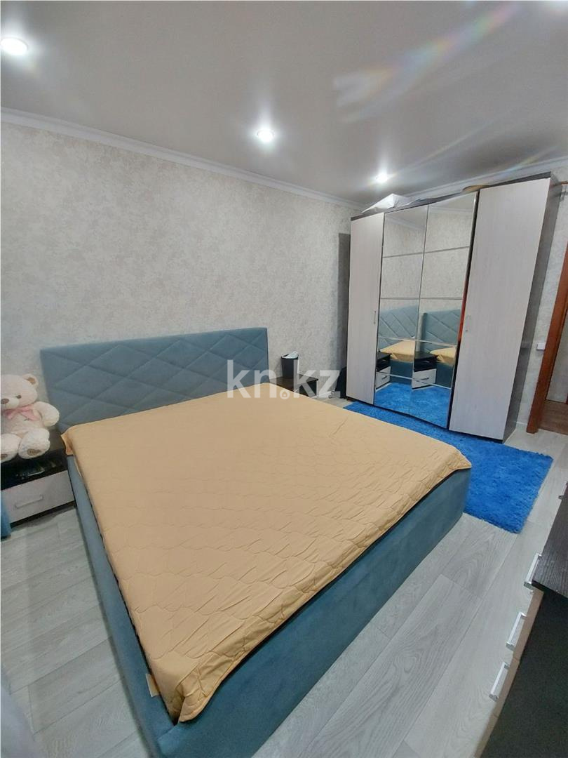 Продажа 2-комнатной квартиры, 54 м², 15 мкр., дом  37 в Караганде - фото 4