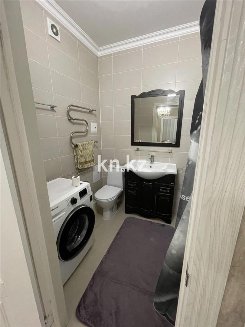 Продажа 2-комнатной квартиры, 64 м², ул. Бараева в Астане - фото 4