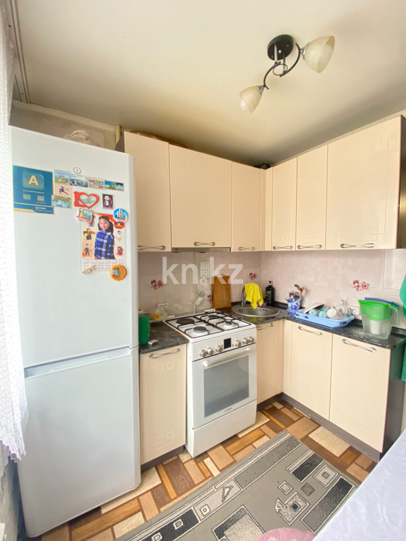 Продажа 4-комнатной квартиры, 62 м², ул. Муканова, дом  8 в Караганде - фото 4