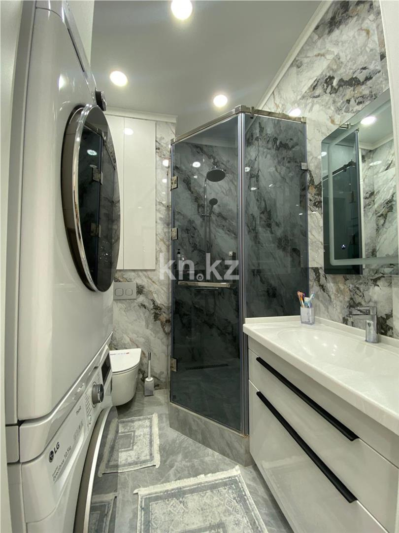 Продажа 3-комнатной квартиры, 107 м², ул. Муканова в Караганде - фото 12