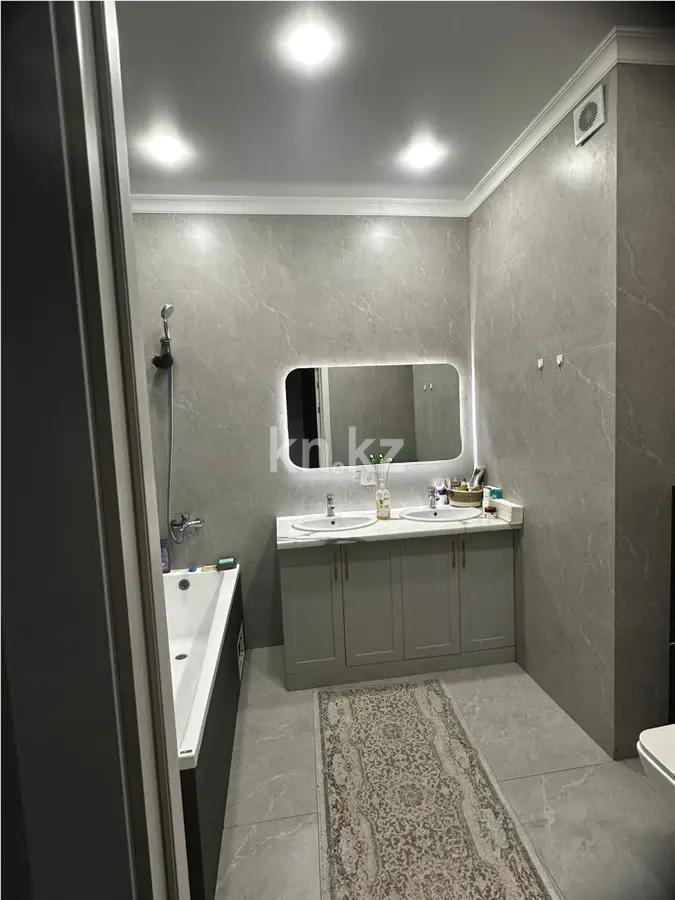 Продажа 2-комнатной квартиры, 67 м², ул. Омарова, дом  2 в Астане - фото 4