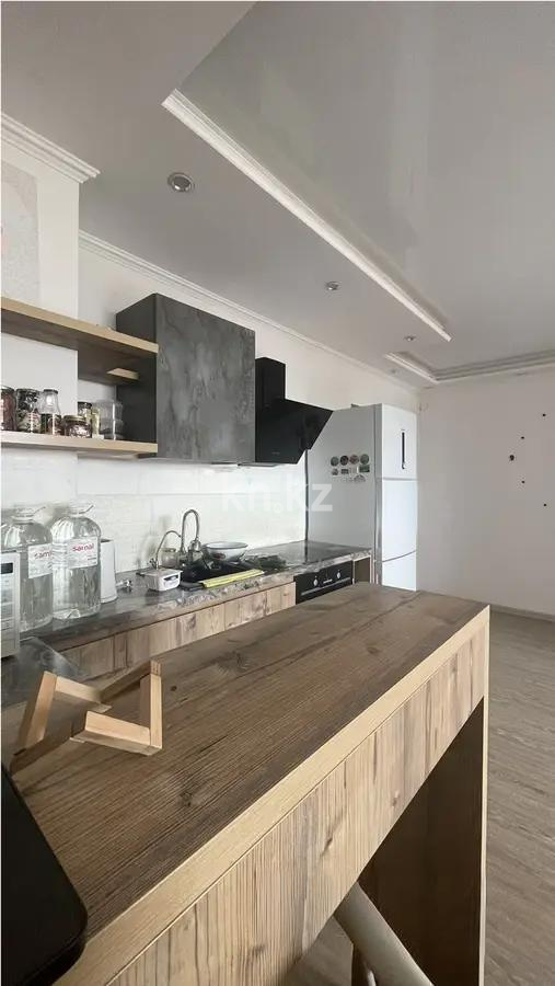 Продажа 1-комнатной квартиры, 34 м², мкр-н Аксай-5, дом  25 в Алматы - фото 2