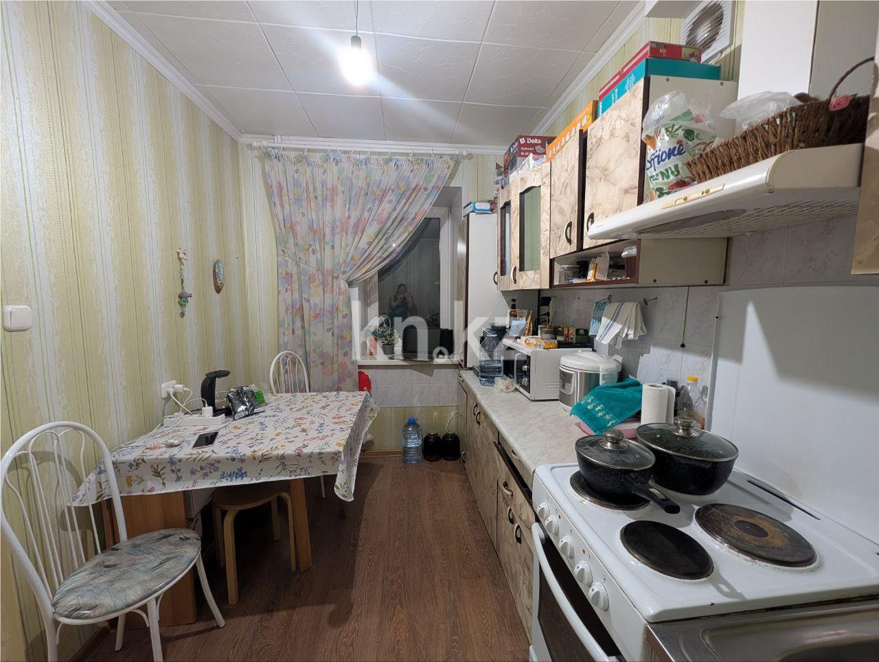 Продажа 2-комнатной квартиры, 50 м², 11 кв-л, дом  15 в Караганде - фото 6