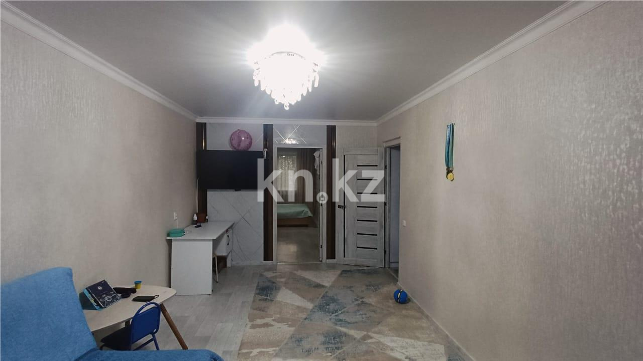 Продажа 2-комнатной квартиры, 47 м², мкр-н 19 в Караганде - фото 2