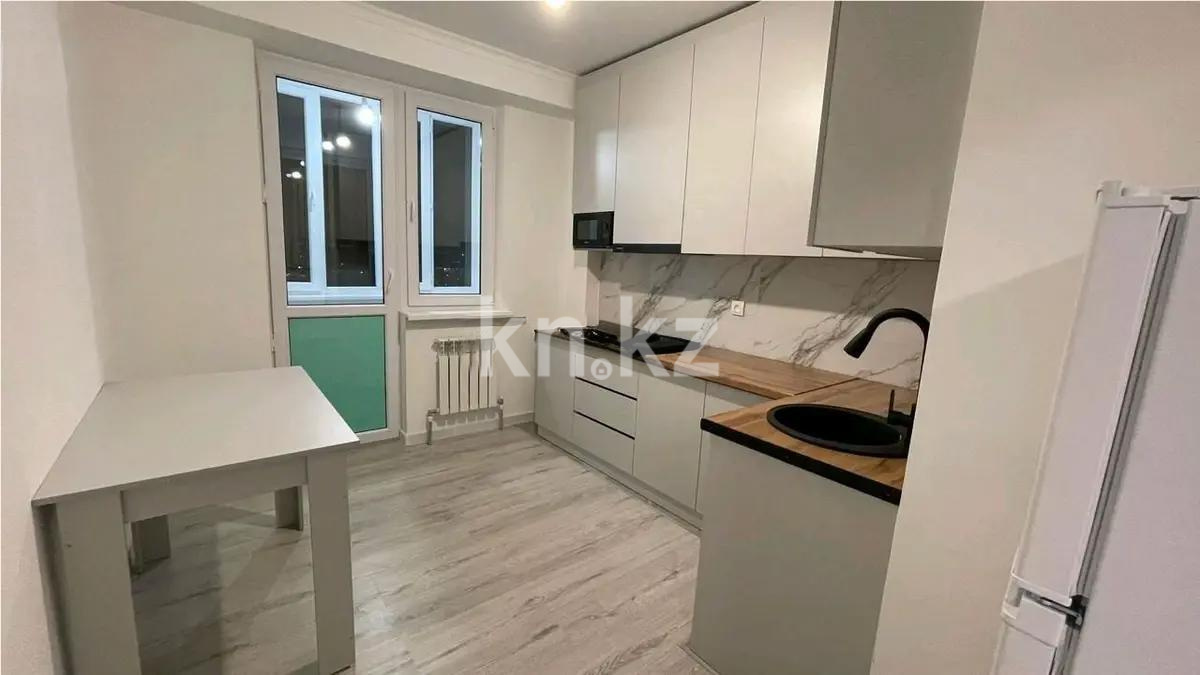 Продажа 2-комнатной квартиры, 54 м², мкр-н 19, дом  75 в Караганде - фото 2