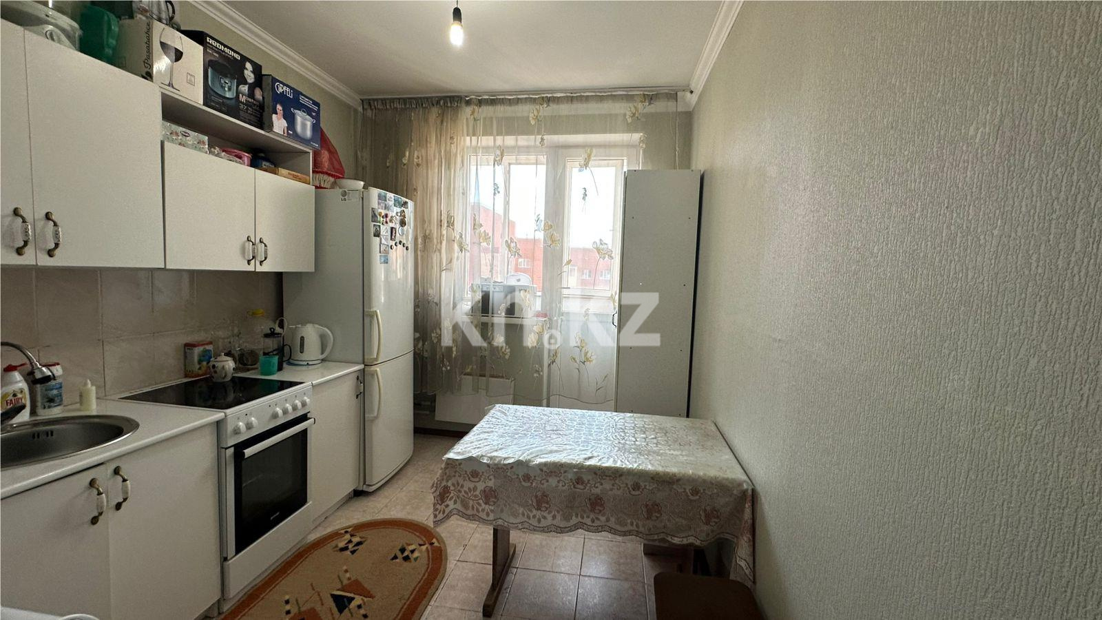 Продажа 2-комнатной квартиры, 53 м², ул. Куйши Дина в Астане - фото 4