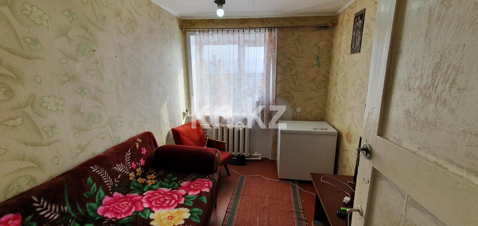 Продажа 4-комнатной квартиры, 59 м², ул. Локомотивная в Караганде - фото 4