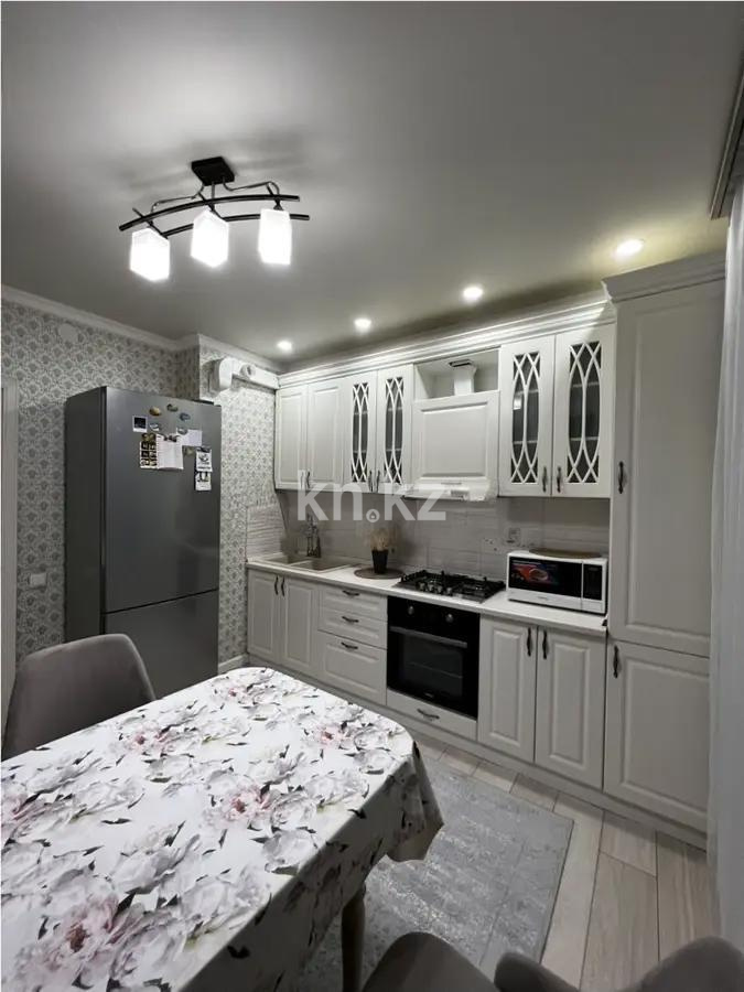 Продажа 2-комнатной квартиры, 55 м², ул. Жунисова, дом  4/12 в Алматы - фото 3