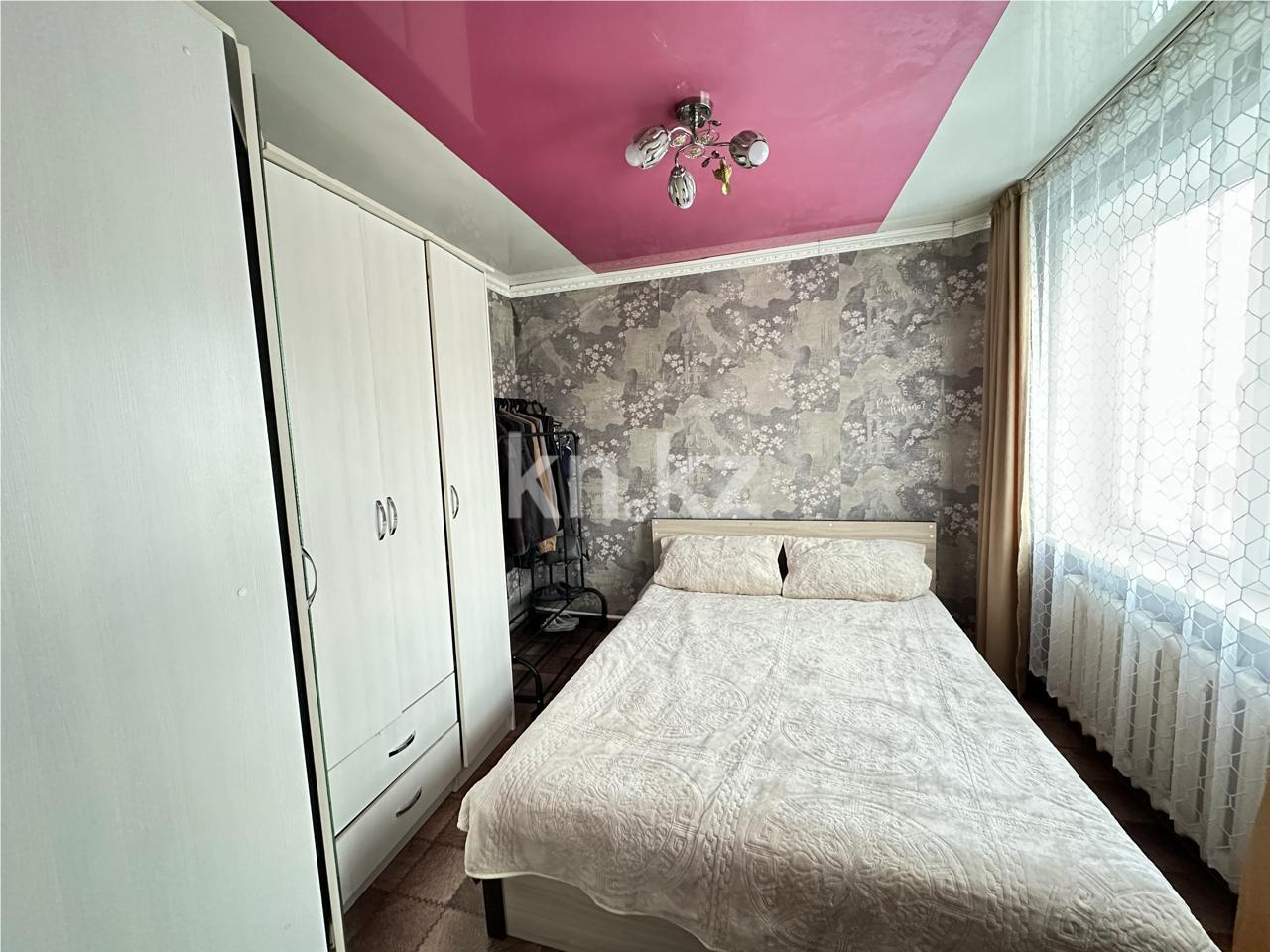 Продажа 4-комнатной квартиры, 61 м², 22 мкр. в Караганде - фото 4