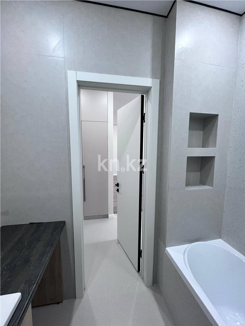 Продажа 2-комнатной квартиры, 52 м², ул. Муканова в Караганде - фото 23