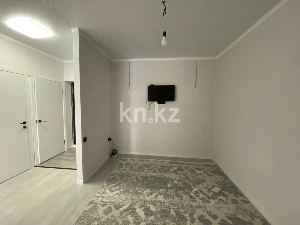 Продажа 2-комнатной квартиры, 49 м², мкр-н Думан-2, дом  12 в Алматы - фото 2