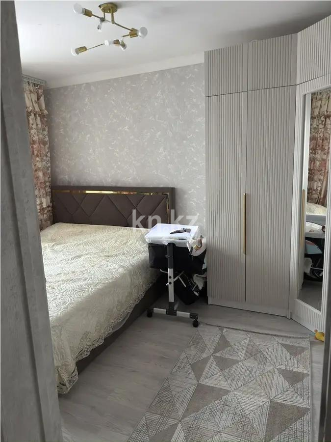 Продажа 2-комнатной квартиры, 56 м², мкр. Голубые Пруды, дом  18 в Караганде - фото 2