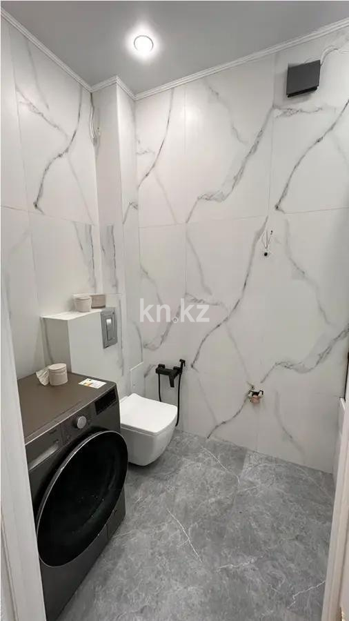 Продажа 2-комнатной квартиры, 69.21 м², ул. Байтурсынова, дом  18 в Астане - фото 4