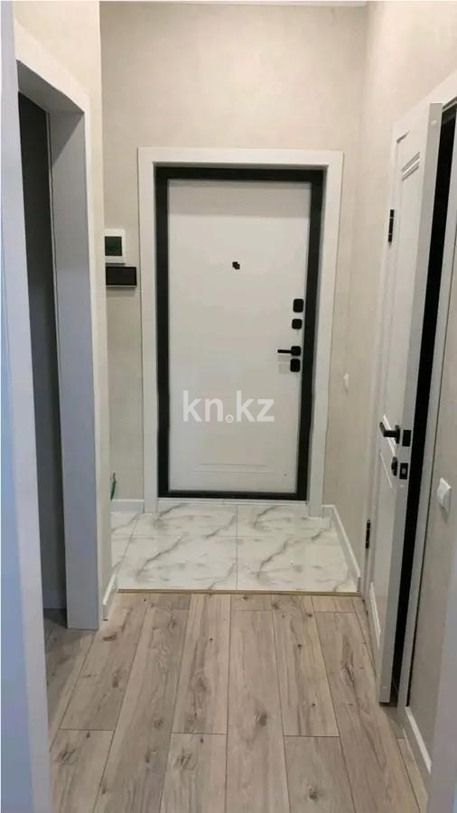 Продажа 1-комнатной квартиры, 37 м², ул. Омарова, дом  12в в Астане - фото 5