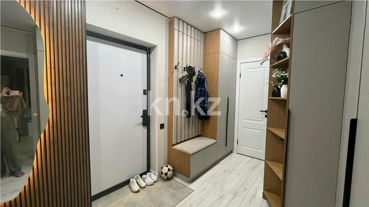 Продажа 2-комнатной квартиры, 54 м², пр. Райымбека, дом  590/7 в Алматы - фото 4