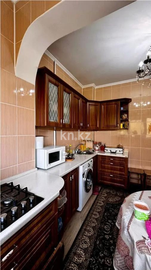 Продажа 2-комнатной квартиры, 57 м², ул. Аносова, дом  50 в Алматы - фото 2