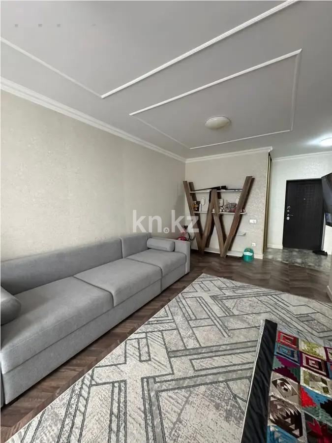 Продажа 1-комнатной квартиры, 50 м², мкр-н Думан-2, дом  25 в Алматы - фото 2