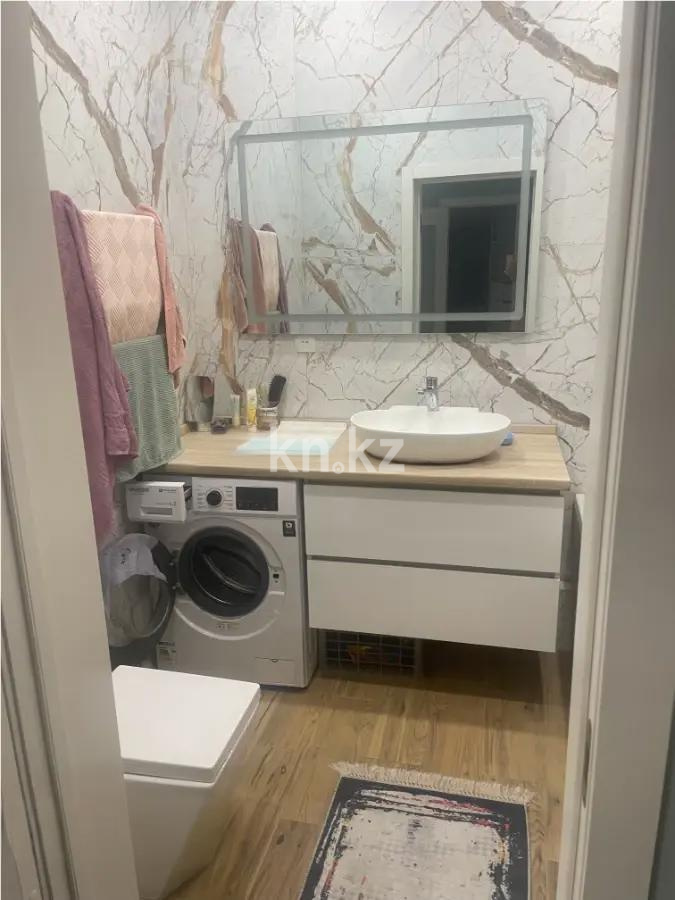 Продажа 2-комнатной квартиры, 50 м², мкр-н Аксай-4, дом  77 в Алматы - фото 2