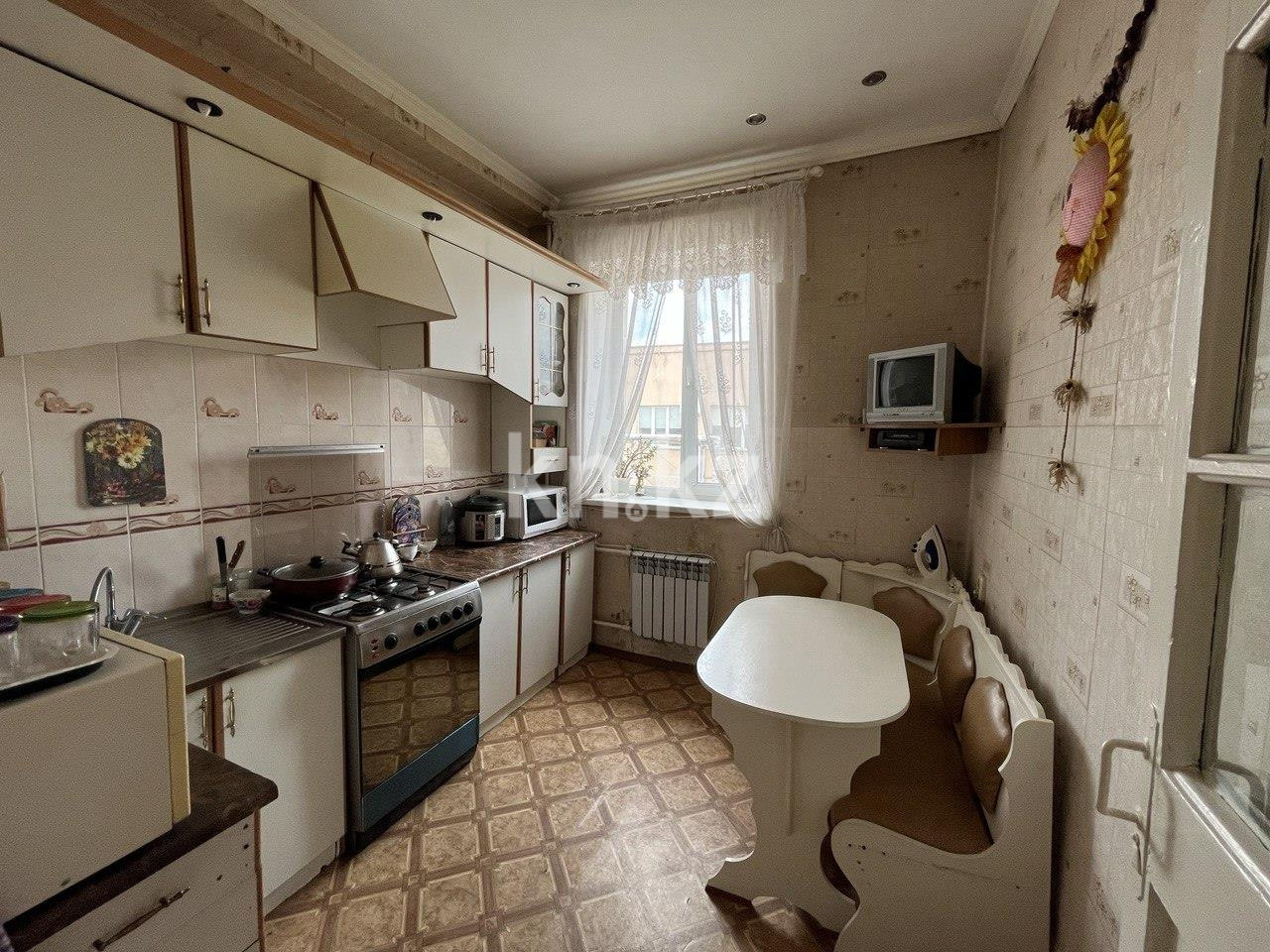 Продажа 2-комнатной квартиры, 62 м², ул. Ерубаева в Караганде - фото 4