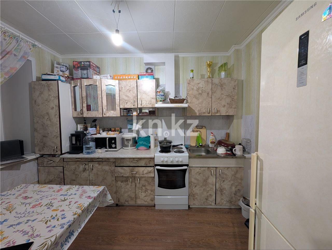 Продажа 2-комнатной квартиры, 50 м², 11 кв-л, дом  15 в Караганде - фото 5